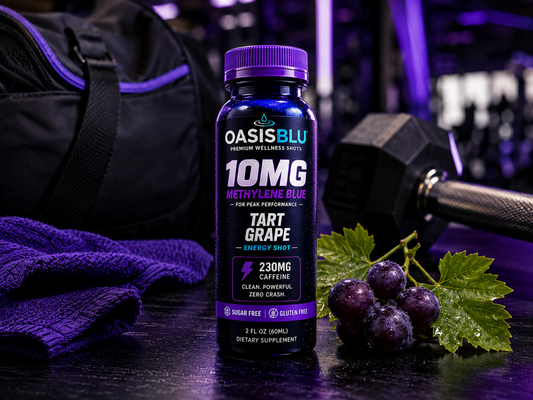 Oasis Blu energy shot bottle with grapes and gym equipment in the background